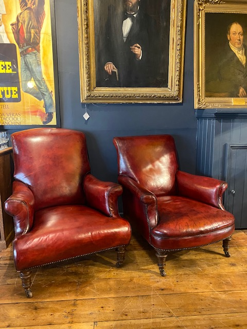 a rare pair of howard & sons antique leather club arm chairs