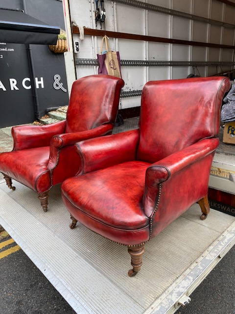 a rare pair of howard & sons antique leather club arm chairs