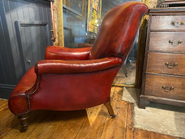 a rare pair of howard & sons antique leather club arm chairs
