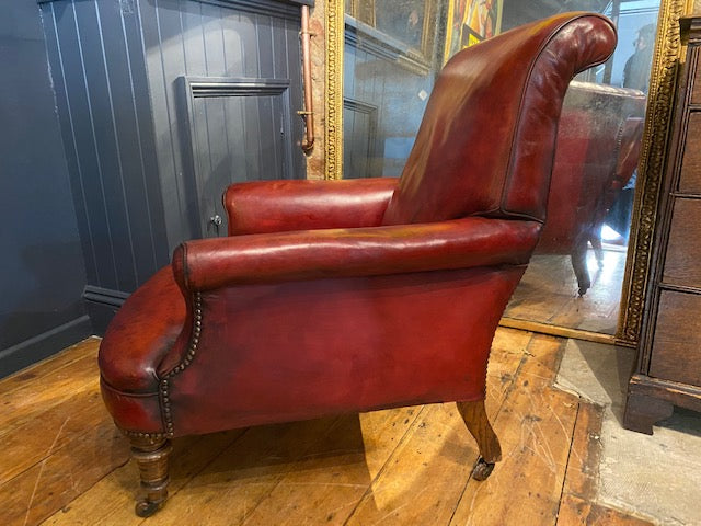 a rare pair of howard & sons antique leather club arm chairs