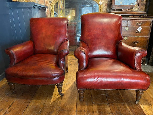 a rare pair of howard & sons antique leather club arm chairs