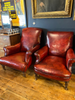 a rare pair of howard & sons antique leather club arm chairs