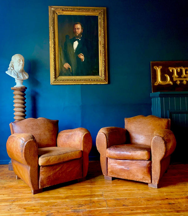 exceptional pair of antique 1940's french moustache back leather club chairs