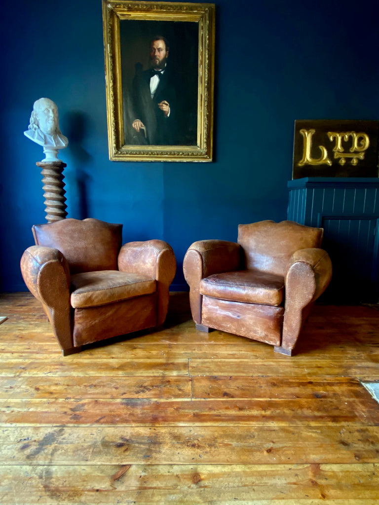 exceptional pair of antique 1940's french moustache back leather club chairs