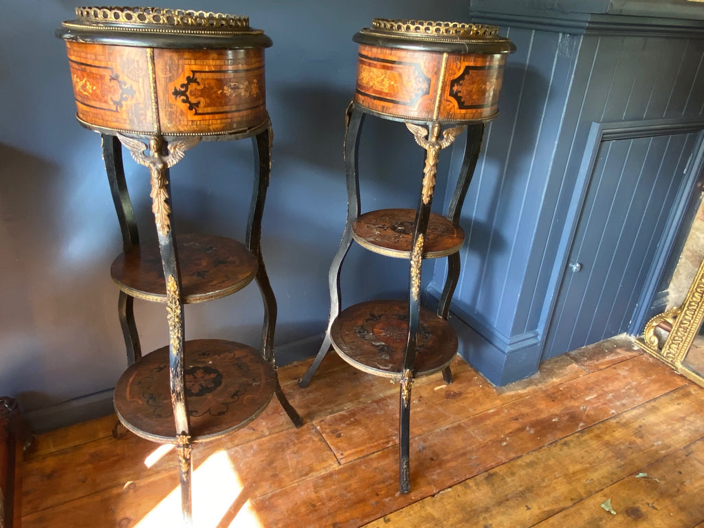 a stunning pair of french marquetry tables with gilt metal ormolu angel mounts