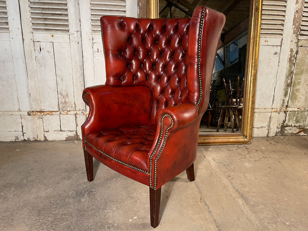 an exceptional antique barrel back porters leather library/fireside arm chair club chair