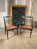 a pair of antique howard and sons georgian cane elbow chairs