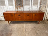 exceptional mid century scandinavian inspired grained teak corinthian side board/console by b & i nathan circa 1960