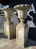 large country house garden urns on plinths