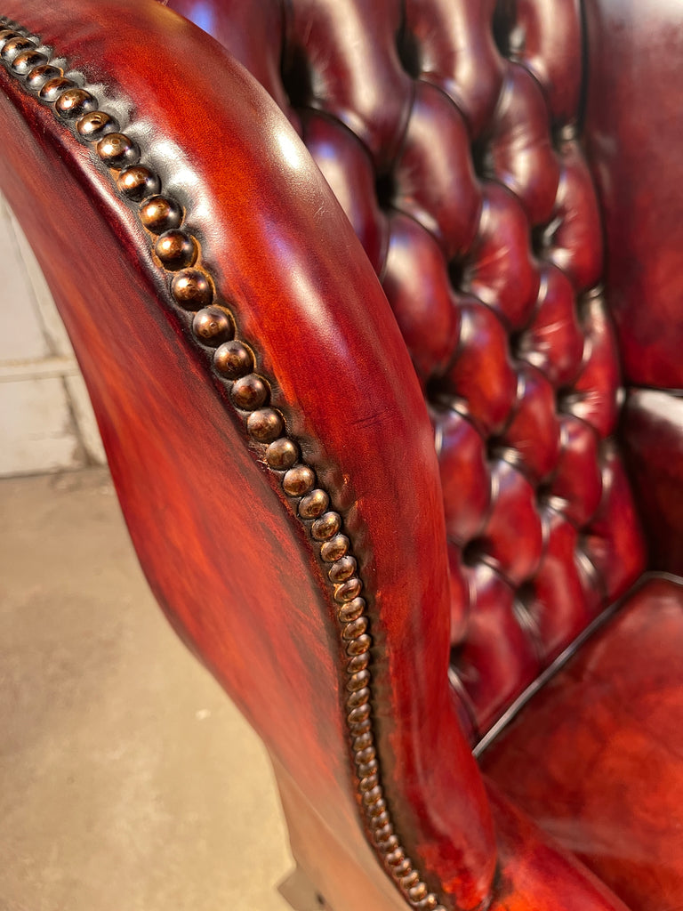 a beautiful antique leather library fireside armchair wingback