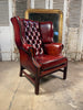 a beautiful antique leather library fireside armchair wingback