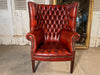 an exceptional antique barrel back porters leather library/fireside arm chair club chair