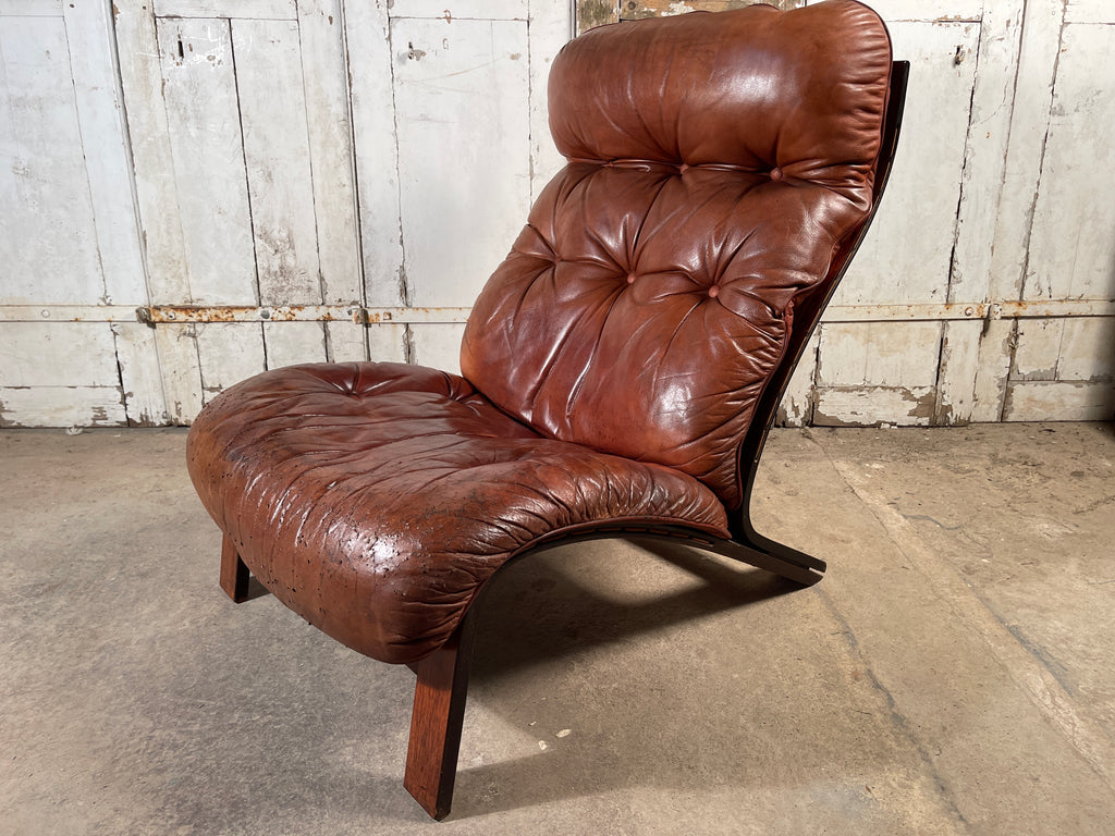 rare mid century rosewood leather lounge chair by iconic norwegian designer oddvin rykken.