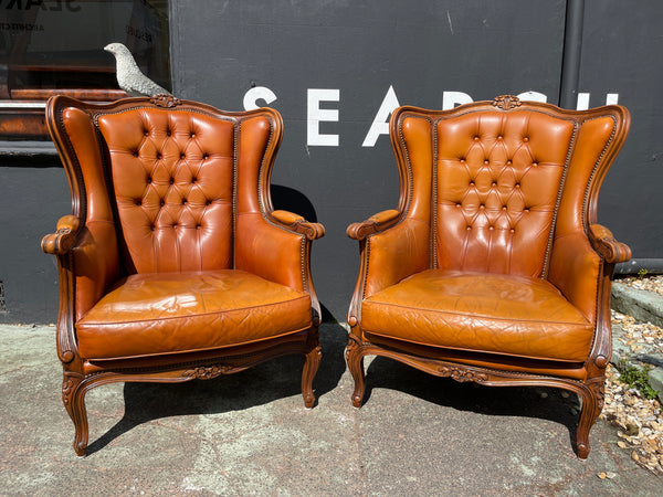 antique french leather armchairs