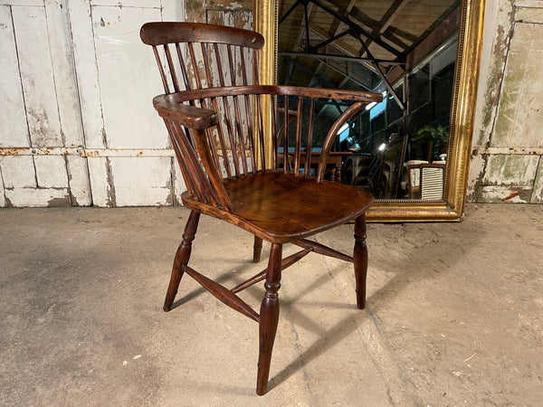 antique comb back arm chair