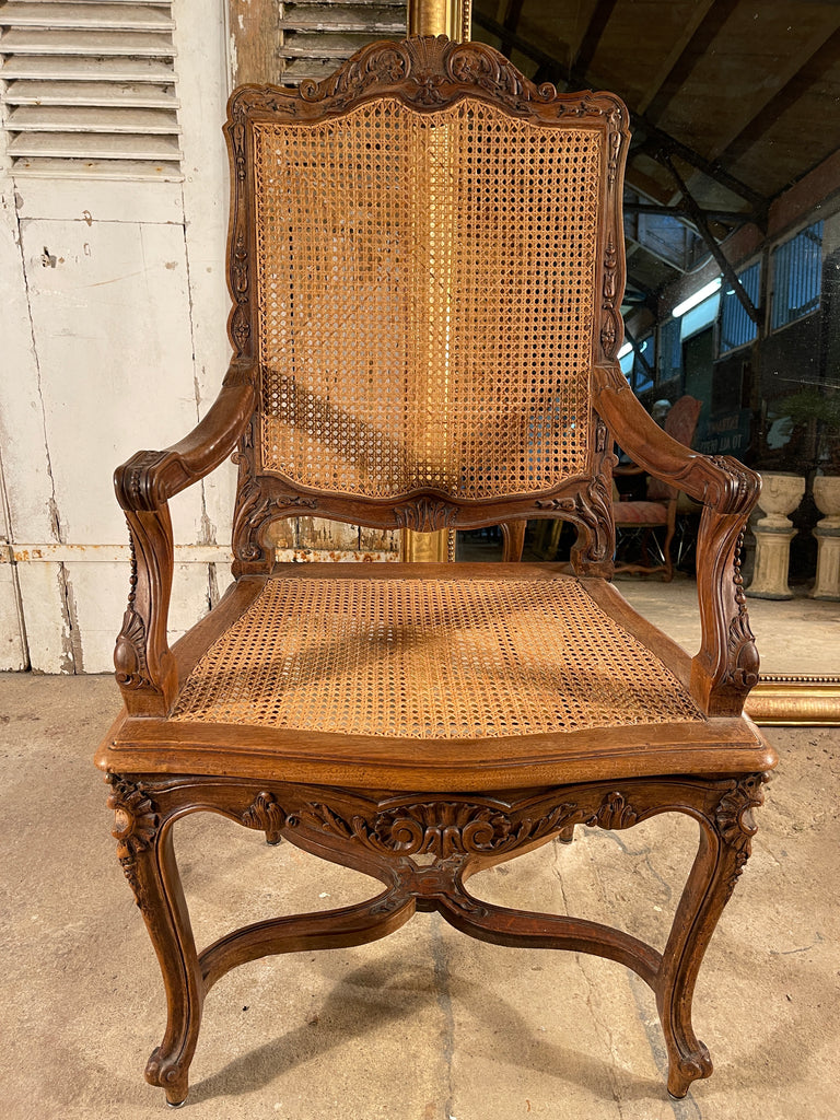 antique french louis xv cane elbow chair
