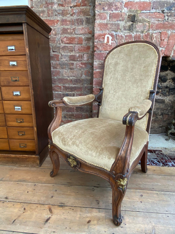 exceptional pair of french empire walnut chairs arm chairs with gilt ormolu mounts