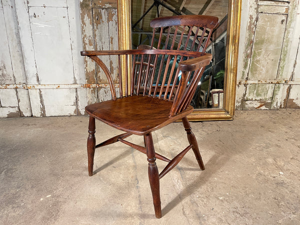 antique comb back arm chair