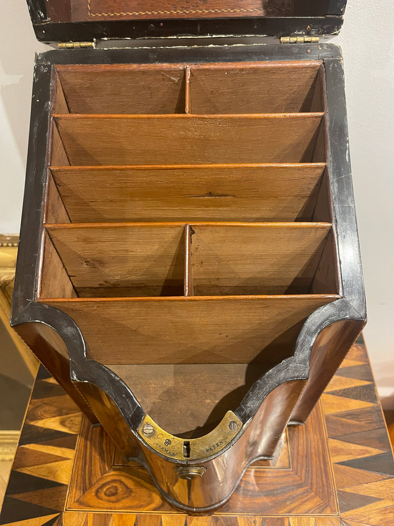 an exceptional quality early georgian flame mahogany serpentine tulip wood banded cutlery box circa 1788
