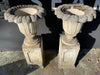 large country house garden urns on plinths
